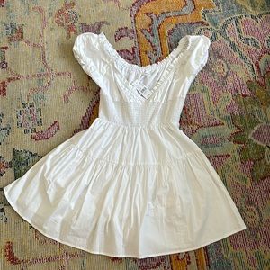 Never worn with tags Pepprmayo super cute white ruffled dress